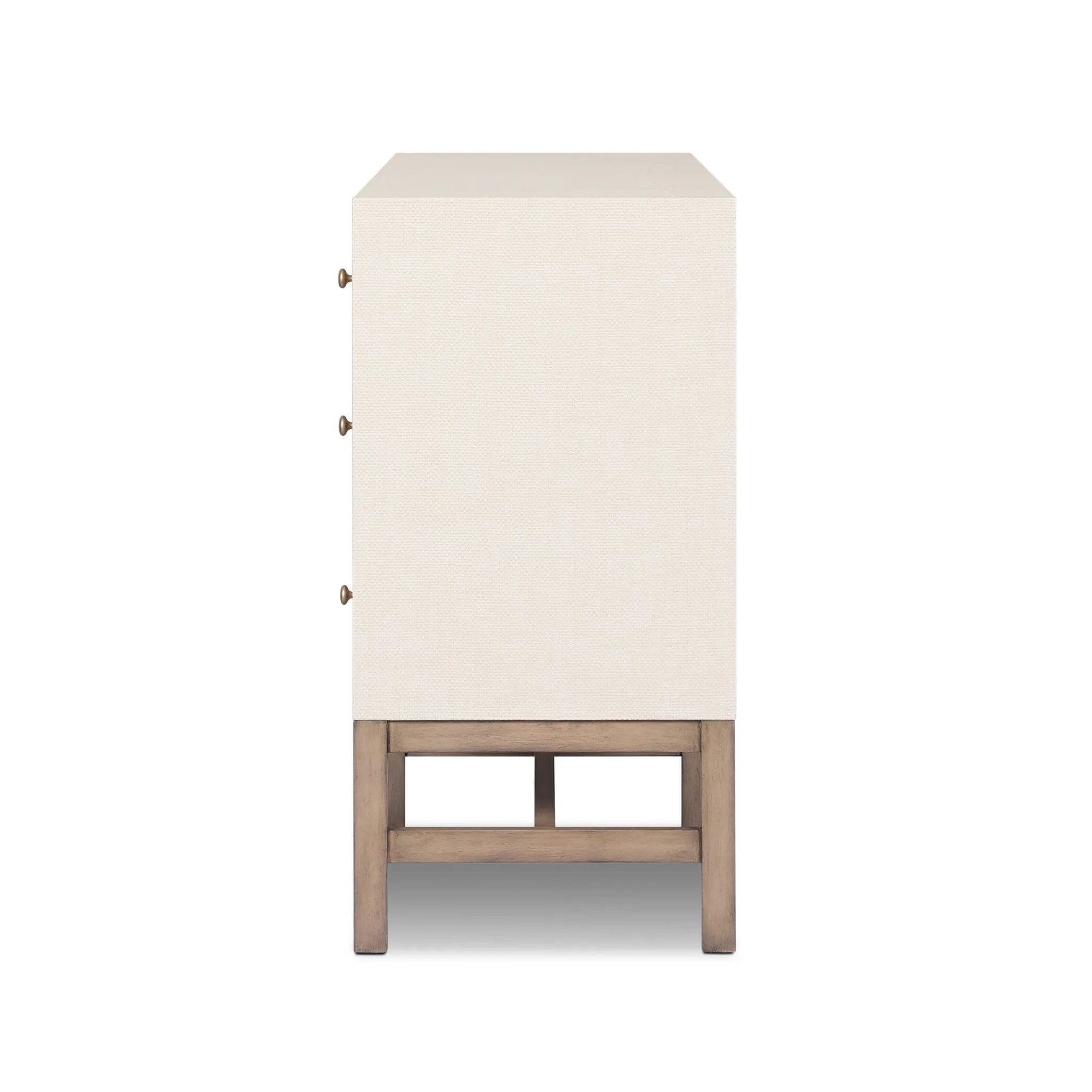 Featuring Fiona Ivory Painted Raffia 6 Drawer Dresser by Four Hands at Amethyst Home. Indulge in luxury with the Fiona Ivory Painted Raffia 6 Drawer Dresser. This elegant dresser boasts a sophisticated ivory painted finish and hand-woven raffia drawers. With six spacious drawers, it offers ample storage space while adding a touch of exclusivity to any bedro. Amethyst Home provides interior design, new home construction design consulting, vintage area rugs, and lighting in the Calabasas metro area.