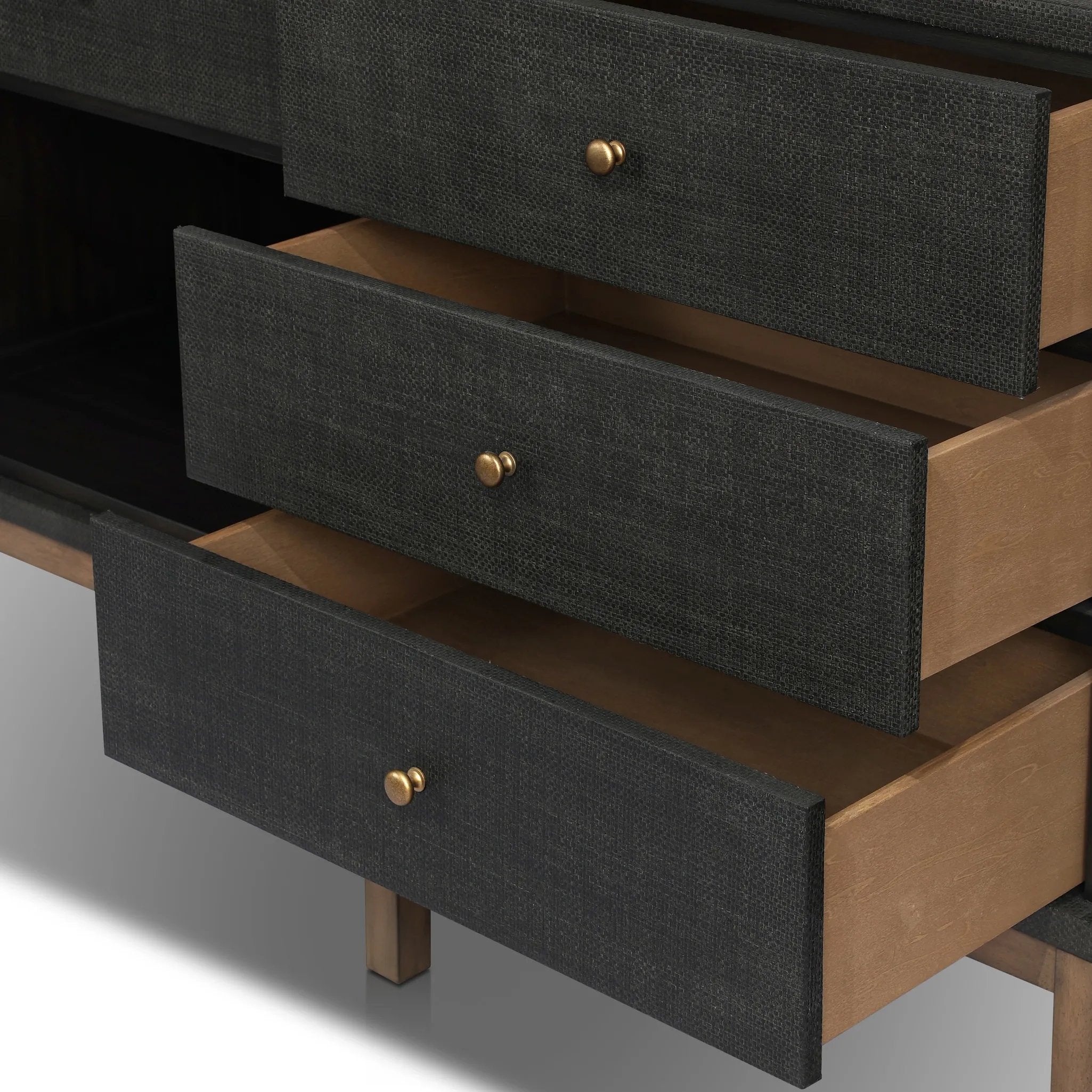 Featuring Fiona Russet Mahogany Sideboard by Four Hands at Amethyst Home. Woven black raffia places a texture-driven twist on sideboard storage. Five roomy drawers and two cabinets feature simple hardware finished in an antique brass, all supported by an open, airy base of solid mahogany.Overall Dimensions: 78.00"w x 18.00"d x 34.50"hWeight : 197.75 lbsMateria. Amethyst Home provides interior design, new home construction design consulting, vintage area rugs, and lighting in the Austin metro area.