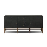 Featuring Fiona Russet Mahogany Sideboard by Four Hands at Amethyst Home. Woven black raffia places a texture-driven twist on sideboard storage. Five roomy drawers and two cabinets feature simple hardware finished in an antique brass, all supported by an open, airy base of solid mahogany.Overall Dimensions: 78.00"w x 18.00"d x 34.50"hWeight : 197.75 lbsMate. Amethyst Home provides interior design, new home construction design consulting, vintage area rugs, and lighting in the Charlotte metro area.