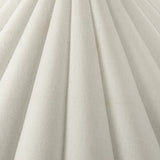 Textures and deep hues unite for this floor lamp's beautiful glow. The scalloped shade features a creamy white canvas exterior covering an antiqued brass interior, and wrought iron pull chains adjust each lightbulb in Baroque-era form Amethyst Home provides interior design, new home construction design consulting, vintage area rugs, and lighting in the Boston metro area.