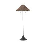 Textures and deep hues unite for this floor lamp's beautiful glow. The scalloped shade features a dark canvas exterior covering an antiqued brass interior, and wrought iron pull chains adjust each lightbulb in Baroque-era form Amethyst Home provides interior design, new home construction design consulting, vintage area rugs, and lighting in the Houston metro area.