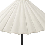 Textures and contrasting hues unite for this table lamp's beautiful glow. The overscale scalloped shade features a creamy white canvas exterior covering an antiqued brass interior, and wrought iron pull chains adjust each lightbulb in Baroque-era form Amethyst Home provides interior design, new home construction design consulting, vintage area rugs, and lighting in the Laguna Beach metro area.