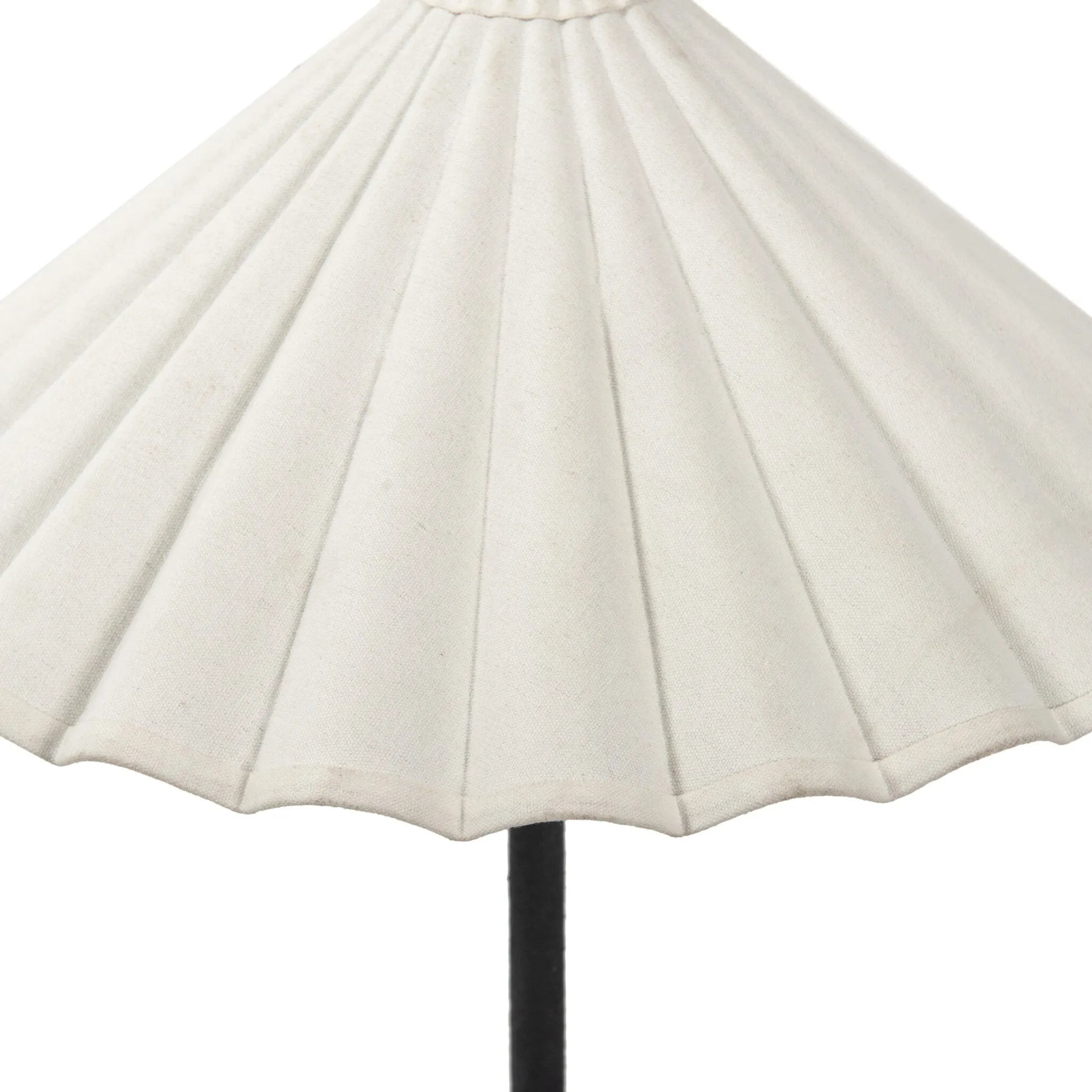 Textures and contrasting hues unite for this table lamp's beautiful glow. The overscale scalloped shade features a creamy white canvas exterior covering an antiqued brass interior, and wrought iron pull chains adjust each lightbulb in Baroque-era form Amethyst Home provides interior design, new home construction design consulting, vintage area rugs, and lighting in the Laguna Beach metro area.