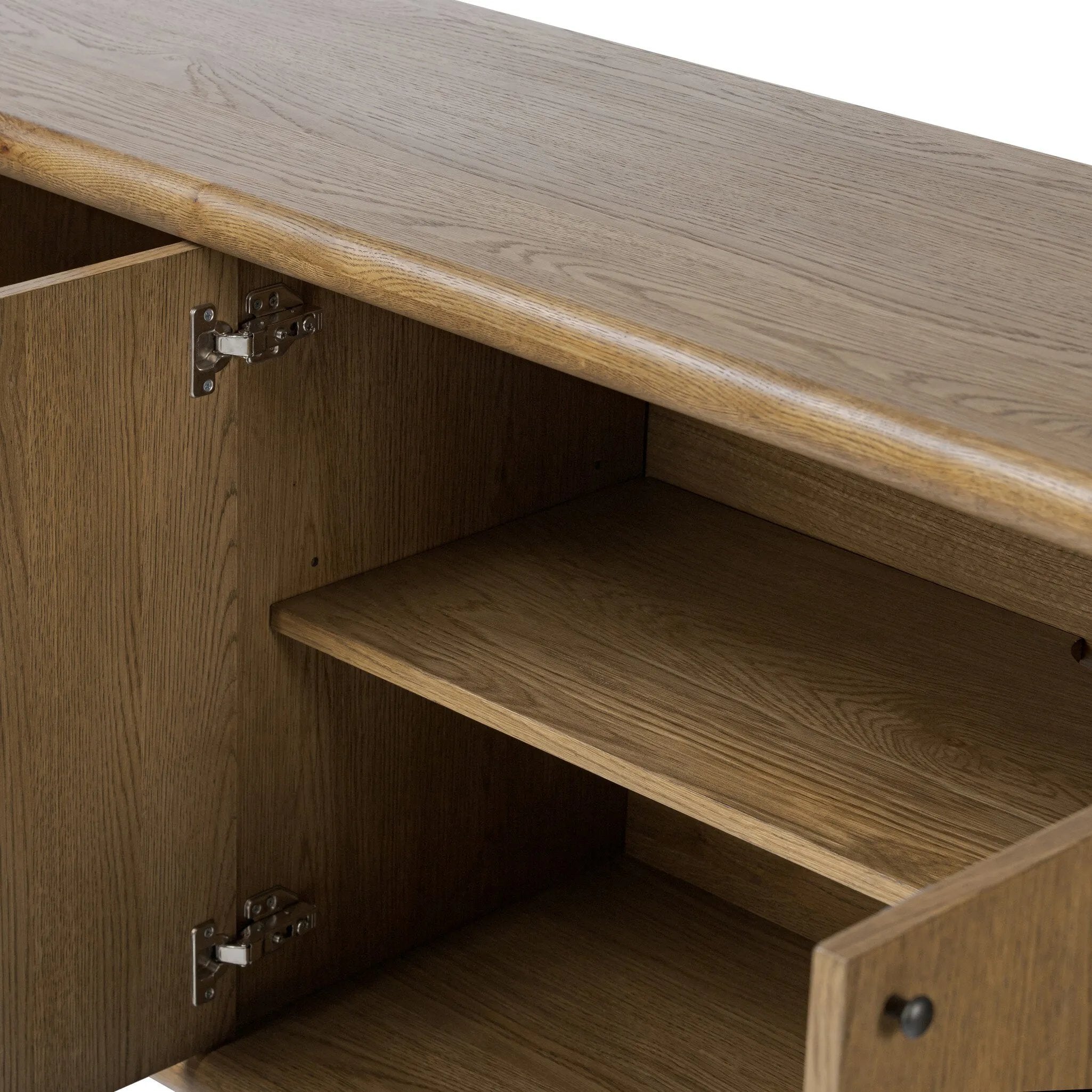 Featuring Florent Amber Oak Sideboard by Four Hands at Amethyst Home. The Florent Amber Oak Sideboard is a versatile and functional addition to any home. Crafted with high-quality materials, this sideboard provides ample storage space and a stylish aesthetic. Perfect for organizing your home and showcasing your personal style, this sideboard is a must-have. Amethyst Home provides interior design, new home construction design consulting, vintage area rugs, and lighting in the Scottsdale metro area.