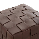 Featuring Flores Lorento Cigar Ottoman by Four Hands at Amethyst Home. Soft, specialized top-grain leather is hand-woven, crafting a look of a treasured vintage find. Use as bonus seating or style with a tray for an extra surface.Overall Dimensions: 19.50"w x 19.50"d x 17.00"hWeight : 31.31 lbsMaterials: Top Grain Leather, Solid Oak, 100% Polyester. Amethyst Home provides interior design, new home construction design consulting, vintage area rugs, and lighting in the Charlotte metro area.