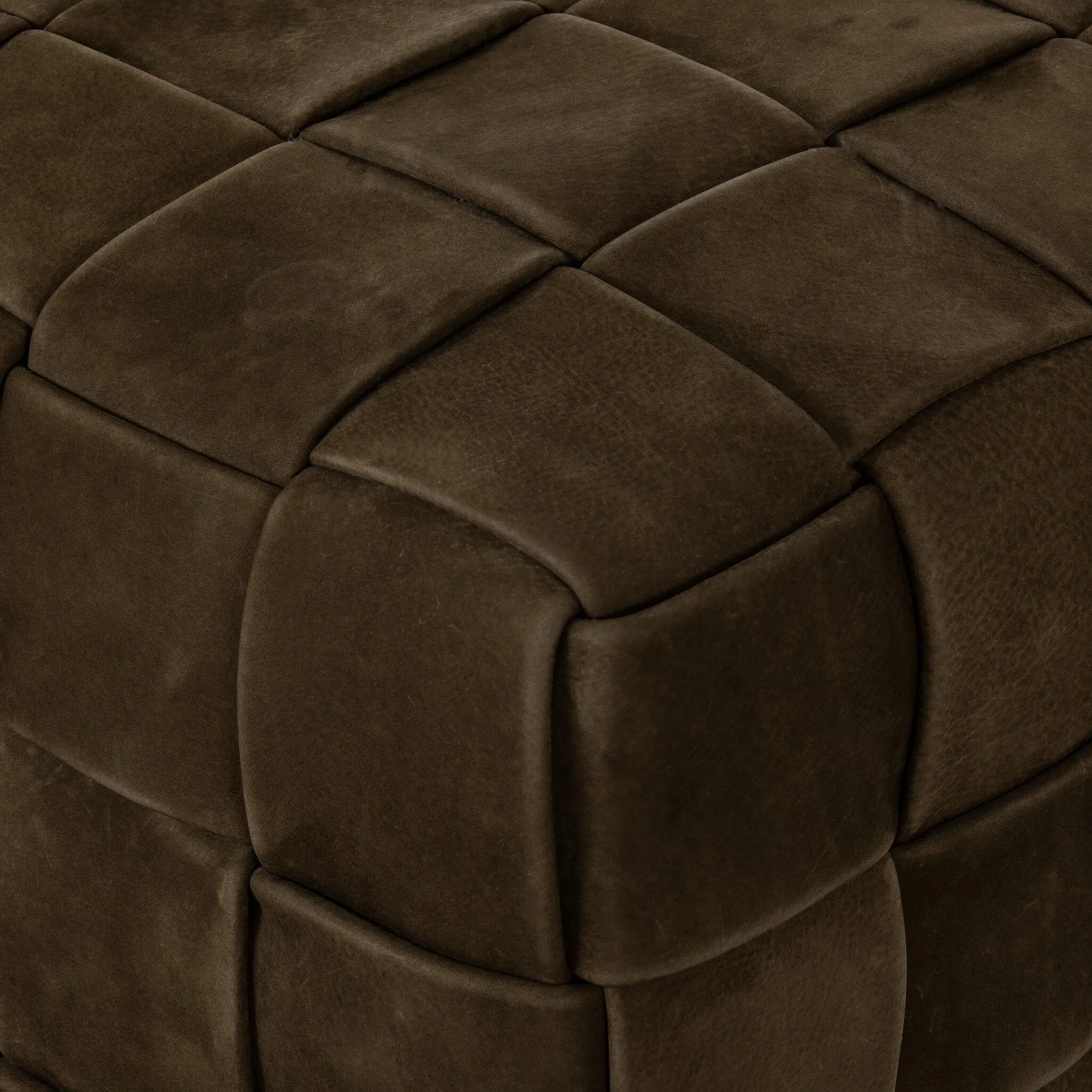 Soft, specialized top-grain leather is hand-woven, crafting a look of a treasured vintage find. Use as bonus seating or style with a tray for an extra surface Amethyst Home provides interior design, new home construction design consulting, vintage area rugs, and lighting in the Miami metro area.