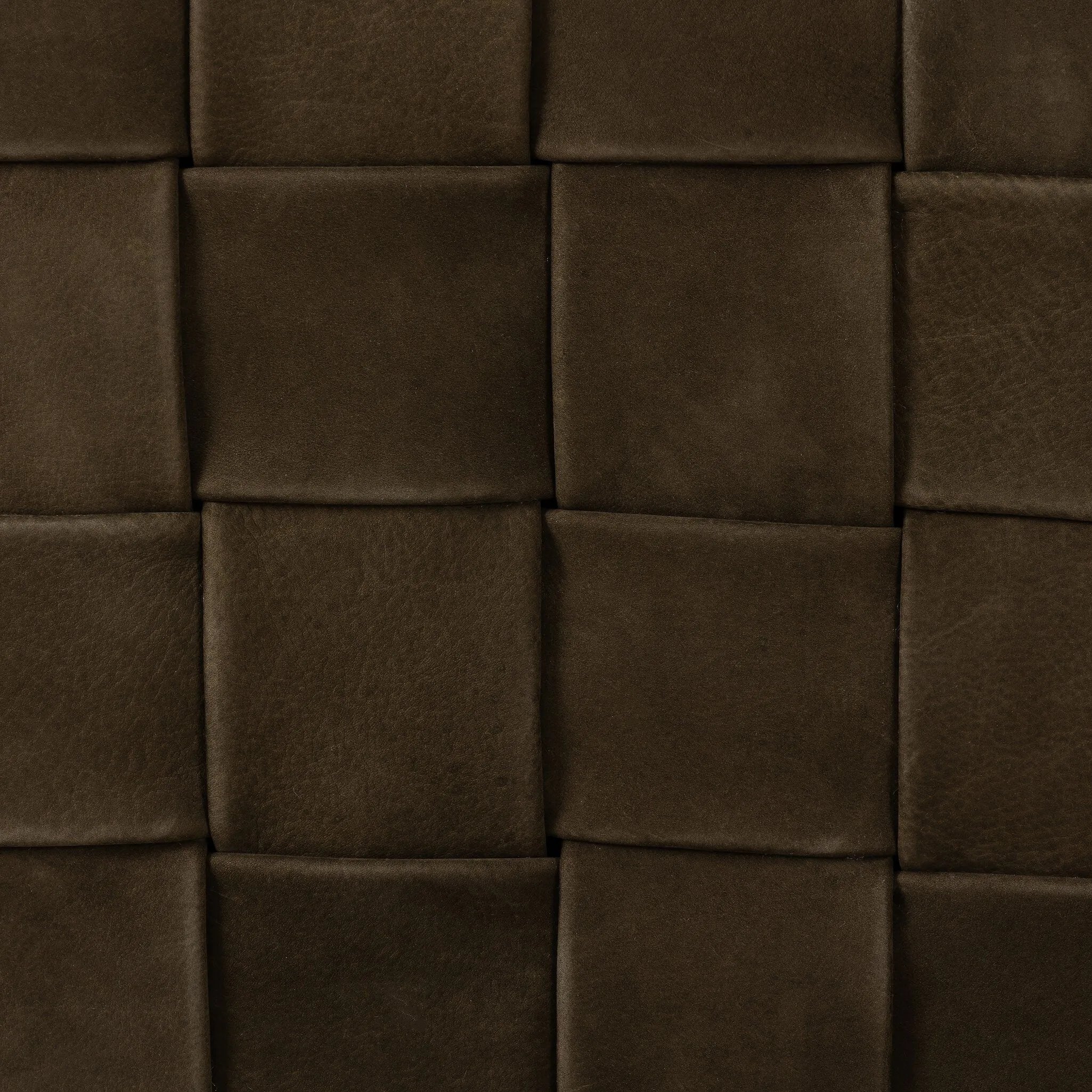 Soft, specialized top-grain leather is hand-woven, crafting a look of a treasured vintage find. Use as bonus seating or style with a tray for an extra surface Amethyst Home provides interior design, new home construction design consulting, vintage area rugs, and lighting in the Newport Beach metro area.