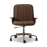 Elevate the office with one easy piece. Inspired by midcentury molded plywood chairs, brown oak veneer frames top-grain leather seat cushioning with slim, soft channeling. A 360-degree swivel burnished brass-finished base with casters allows for easy movement. Amethyst Home provides interior design, new home construction design consulting, vintage area rugs, and lighting in the Washington metro area.