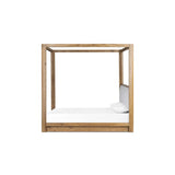 Minimalist and modern, this platform-style canopy bed is framed to a low profile and softened with an upholstered headboard. 