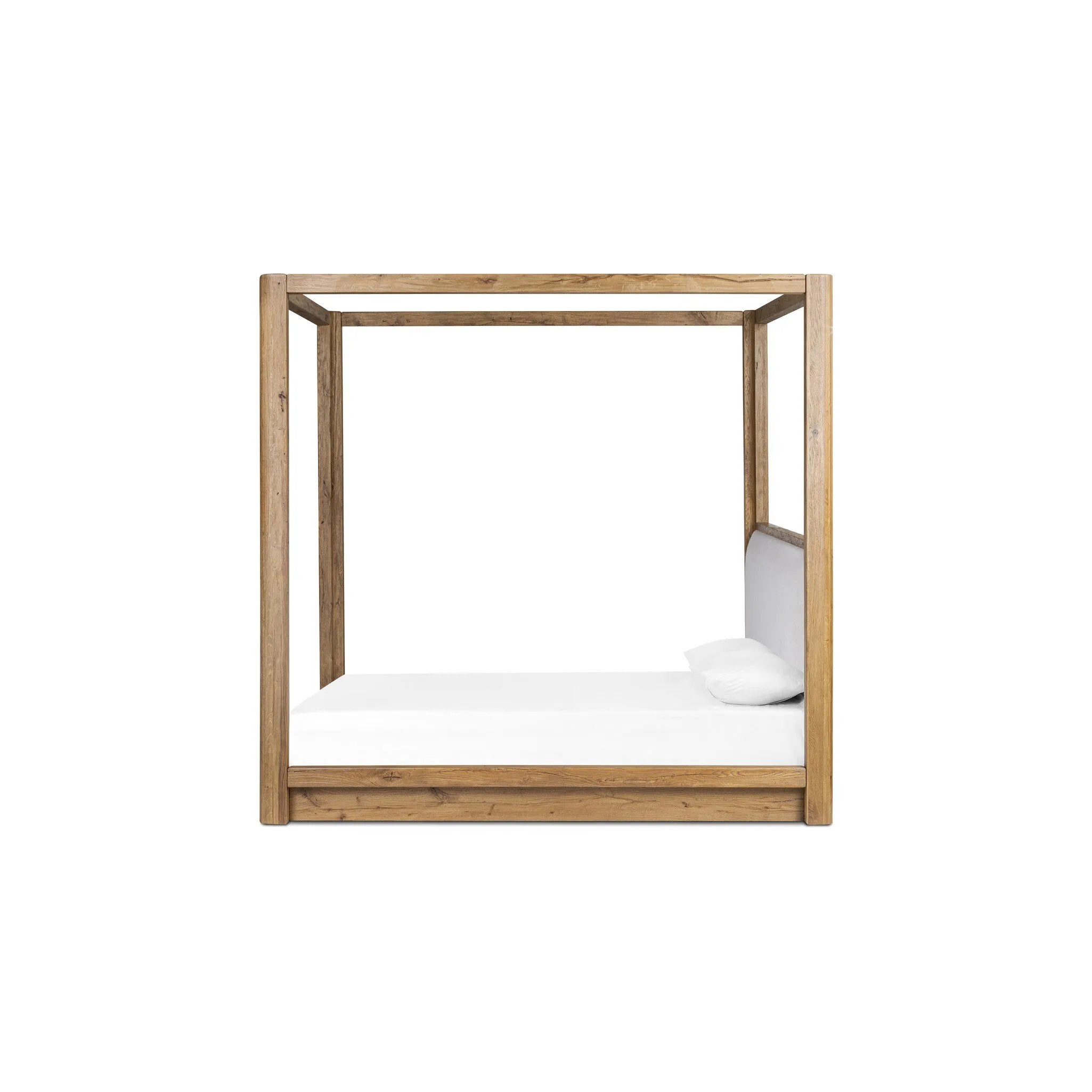 Minimalist and modern, this platform-style canopy bed is framed to a low profile and softened with an upholstered headboard. 