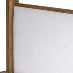 Minimalist and modern, this platform-style canopy bed is framed to a low profile and softened with an upholstered headboard. 