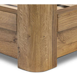 Minimalist and modern, this platform-style canopy bed is framed to a low profile and softened with an upholstered headboard. 