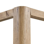 Minimalist and modern, this platform-style canopy bed is framed to a low profile and softened with an upholstered headboard. 