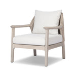 Dove-grey teak with a washed finish, linen-like upholstery and a braided woven seatback blend together for a monochromatic look on this outdoor chair. The slightly sun-aged look comes together for a style that evokes coastal vibes. Cover or store inside during inclement weather or when not in use. Amethyst Home provides interior design, new home construction design consulting, vintage area rugs, and lighting in the Kansas City metro area.