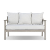 Dove-grey teak with a washed finish, linen-like upholstery and a braided woven seatback blend together for a monochromatic look on this outdoor sofa, perfect for small spaces. The slightly sun-aged look comes together for a style that evokes coastal vibes. Cover or store inside during inclement weather or when not in use. Amethyst Home provides interior design, new home construction design consulting, vintage area rugs, and lighting in the Newport Beach metro area.