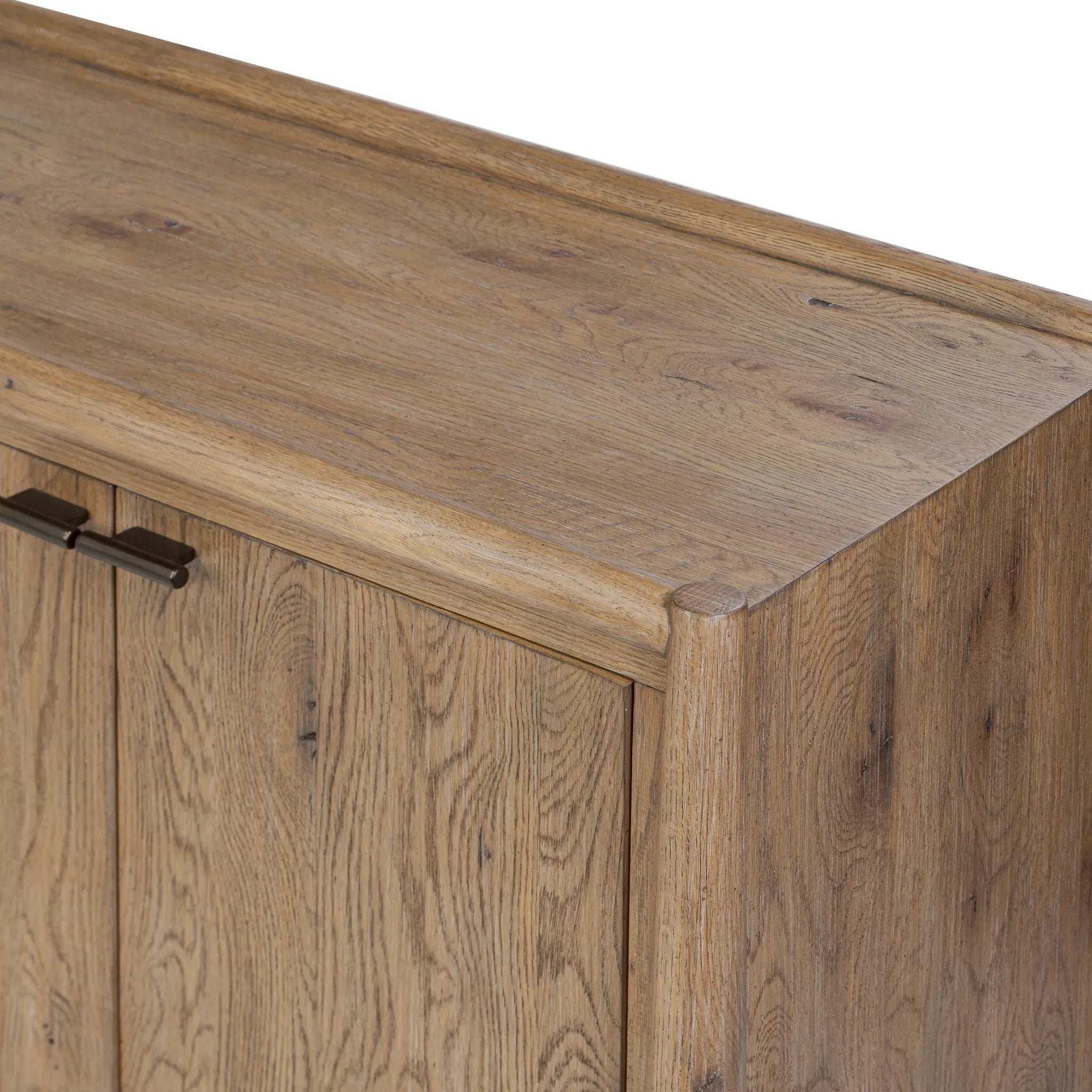 The traditional spindle structure brought to modern speed. Made from weathered oak, the sideboard brings generous storage space to dining and entertaining, working into a range of spaces and collections with ease. Simple cylindrical hardware is finished in an aged bronze Amethyst Home provides interior design, new home construction design consulting, vintage area rugs, and lighting in the Des Moines metro area.