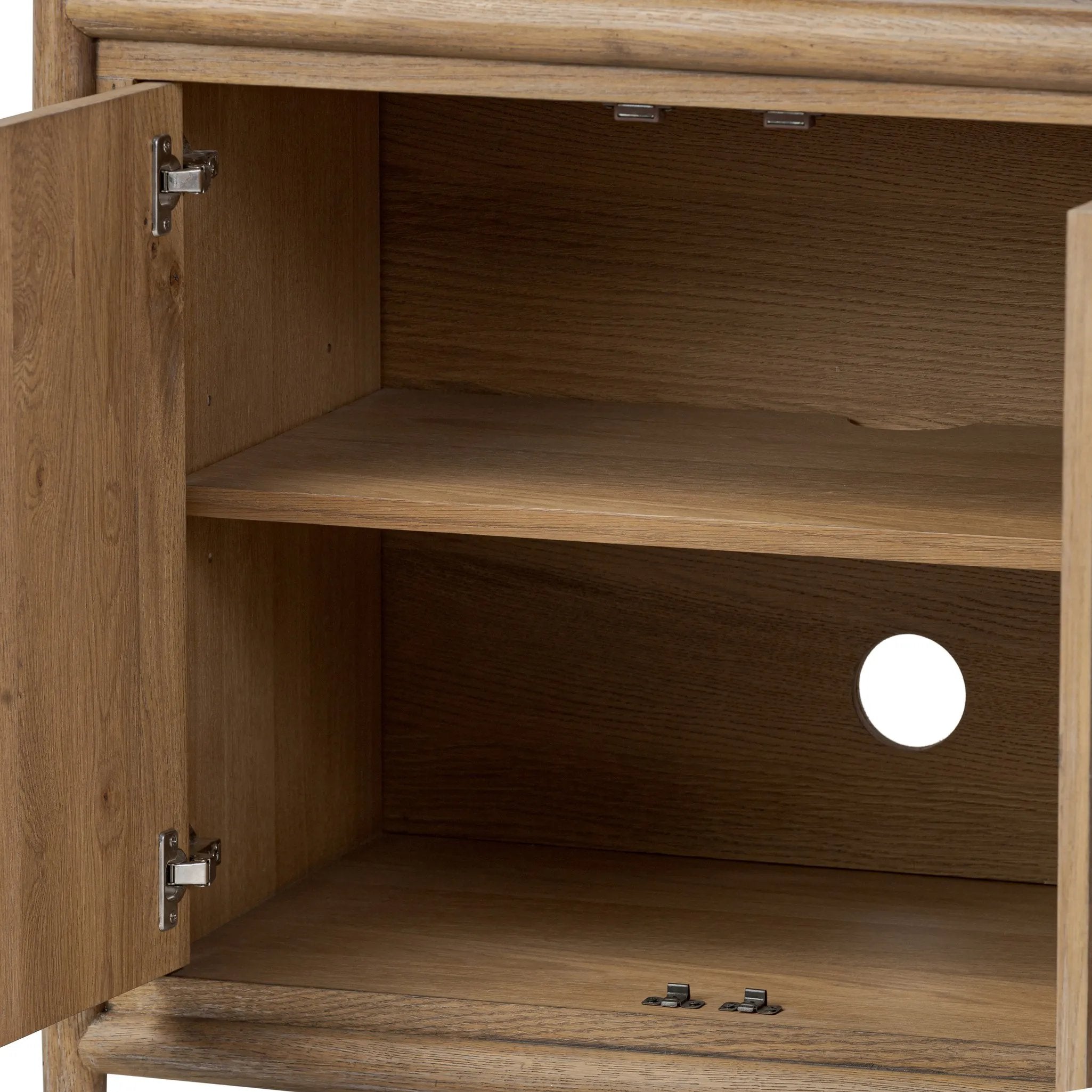 The traditional spindle structure brought to modern speed. Made from weathered oak, the sideboard brings generous storage space to dining and entertaining, working into a range of spaces and collections with ease. Simple cylindrical hardware is finished in an aged bronze Amethyst Home provides interior design, new home construction design consulting, vintage area rugs, and lighting in the Scottsdale metro area.