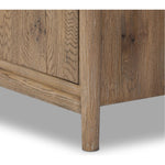 The traditional spindle structure brought to modern speed. Made from weathered oak, the sideboard brings generous storage space to dining and entertaining, working into a range of spaces and collections with ease. Simple cylindrical hardware is finished in an aged bronze Amethyst Home provides interior design, new home construction design consulting, vintage area rugs, and lighting in the Tampa metro area.