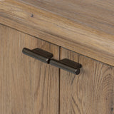 The traditional spindle structure brought to modern speed. Made from weathered oak, the sideboard brings generous storage space to dining and entertaining, working into a range of spaces and collections with ease. Simple cylindrical hardware is finished in an aged bronze Amethyst Home provides interior design, new home construction design consulting, vintage area rugs, and lighting in the Winter Garden metro area.