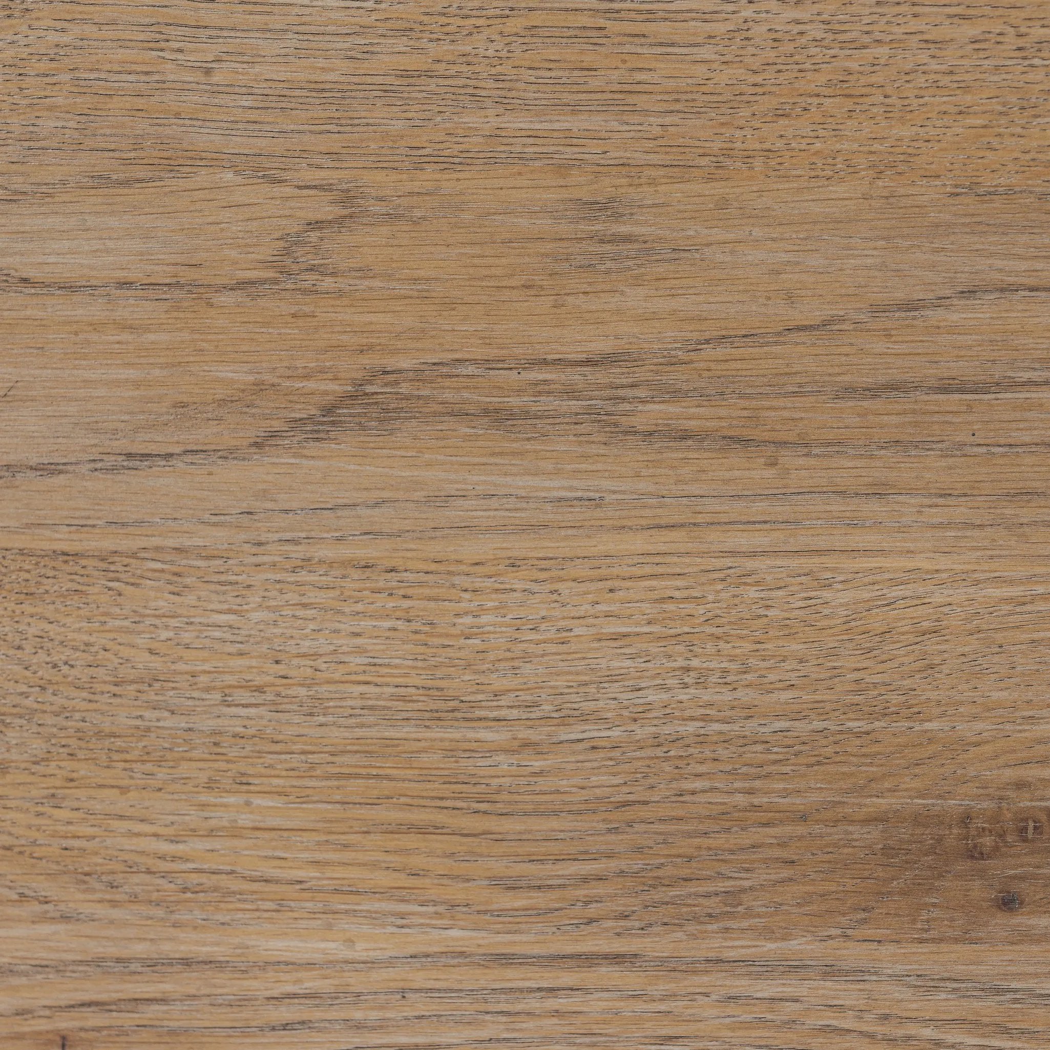 A rustic oak bar cabinet shapes subtly curved corners, bringing a handcrafted look to a minimalist form. Fixed center shelves, functional drawers and glass fronts for open display. Simple hardware is finished in an aged bronze Amethyst Home provides interior design, new home construction design consulting, vintage area rugs, and lighting in the Omaha metro area.