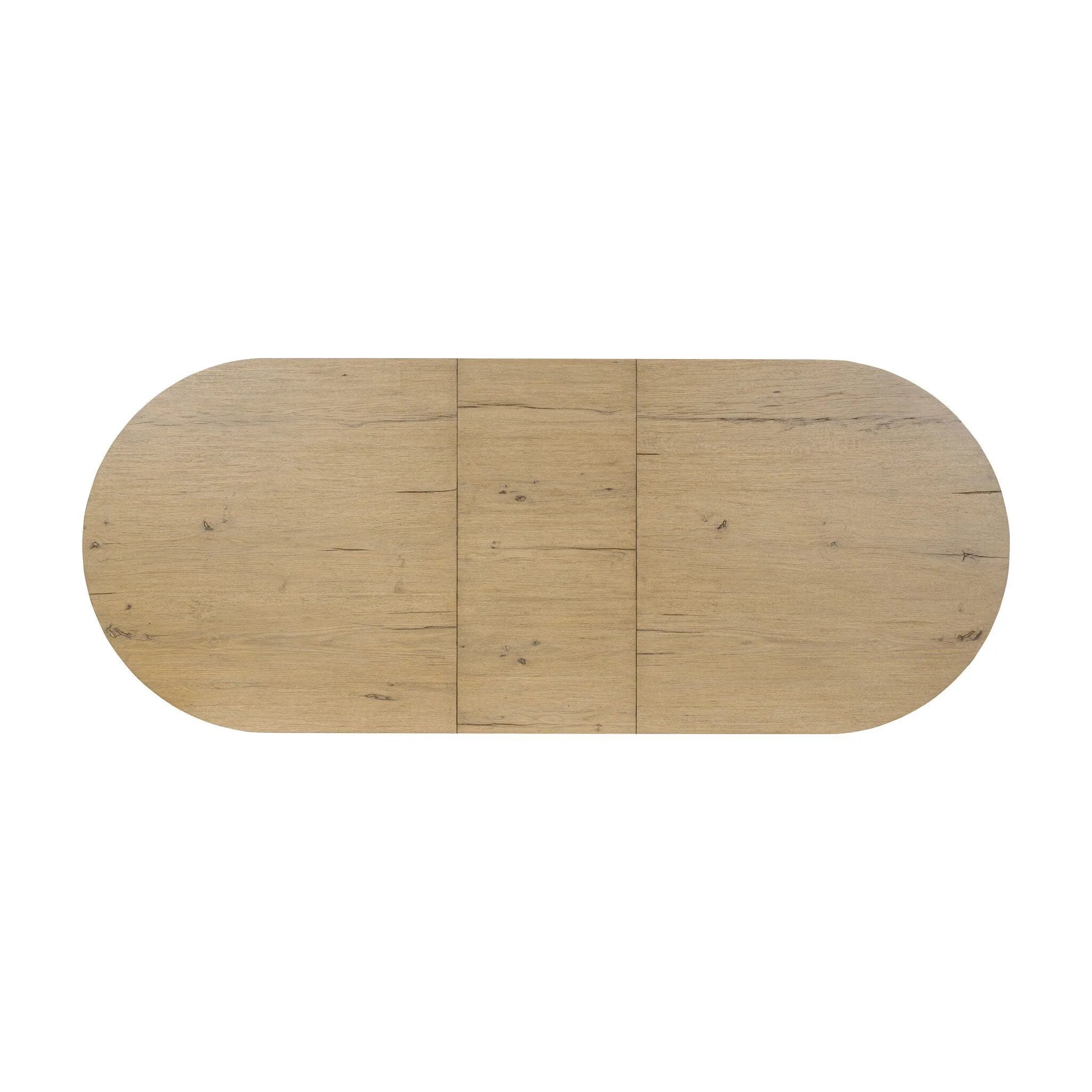 Make space to gather around. This extendable dining table is crafted from drifted oak veneer with a semi-trestle base, thick legs and an oval-shaped surface. The extension expands the table from 84" to a roomier 104" Amethyst Home provides interior design, new home construction design consulting, vintage area rugs, and lighting in the Portland metro area.