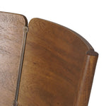 Bring a mixed material moment to your dining space with a Scandinavian-inspired seating style. Solid parawood forms a beautifully curved frame for a slim-profile seat upholstered in taupe high-performance fabric. On the back panel, a thin iron inlay elevates the look with a detail-driven finishing touch. Amethyst Home provides interior design, new home construction design consulting, vintage area rugs, and lighting in the Calabasas metro area.