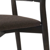 Inspired by simple Scandinavian styling, a dark-finished parawood stool's slit-back metal inlay adds a decorative touch. Easy curves from bent wood give a smooth silhouette. Upholstered with a thin seat cushion upholstered in black performance fabric, perfect for everyday dining. Amethyst Home provides interior design, new home construction design consulting, vintage area rugs, and lighting in the Calabasas metro area.