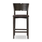 Inspired by simple Scandinavian styling, a dark-finished parawood stool's slit-back metal inlay adds a decorative touch. Easy curves from bent wood give a smooth silhouette. Sized for the counter and upholstered with a thin seat cushion upholstered in black performance fabric, perfect for dining or entertaining. Amethyst Home provides interior design, new home construction design consulting, vintage area rugs, and lighting in the Monterey metro area.