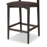 Inspired by simple Scandinavian styling, a dark-finished parawood stool's slit-back metal inlay adds a decorative touch. Easy curves from bent wood give a smooth silhouette. Sized for the counter and upholstered with a thin seat cushion upholstered in black performance fabric, perfect for dining or entertaining. Amethyst Home provides interior design, new home construction design consulting, vintage area rugs, and lighting in the Salt Lake City metro area.