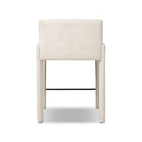A bold design inspired by Italian modernism. Made from Crypton® performance fabric, with a wide format that contrasts slimmer chamfered legs and a thin metal footrest. The result: A beautiful balance of scale, perfectly sized for the counter. Amethyst Home provides interior design, new home construction design consulting, vintage area rugs, and lighting in the Boston metro area.