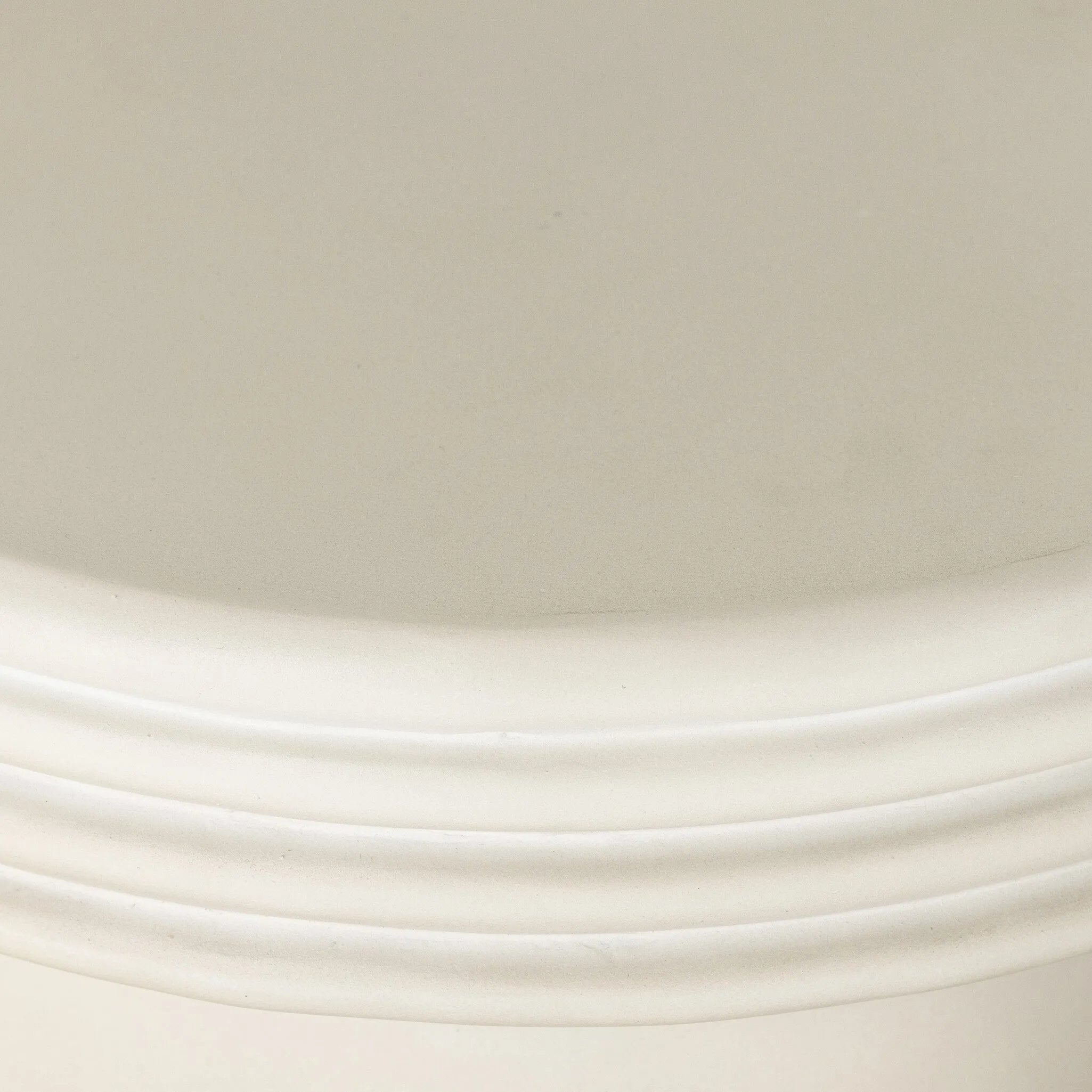 Statuesque and streamlined, an outdoor end table is crafted of smooth solid concrete and detailed with ribbed edging on top. Cover or store indoors during inclement weather and when not in use.As enthusiasts of wabi sabi design at Amethyst, we love the warm modern inspired Grecia Outdoor End Table. Amethyst Home provides interior design, new home construction design consulting, vintage area rugs, and lighting in the Boston metro area.