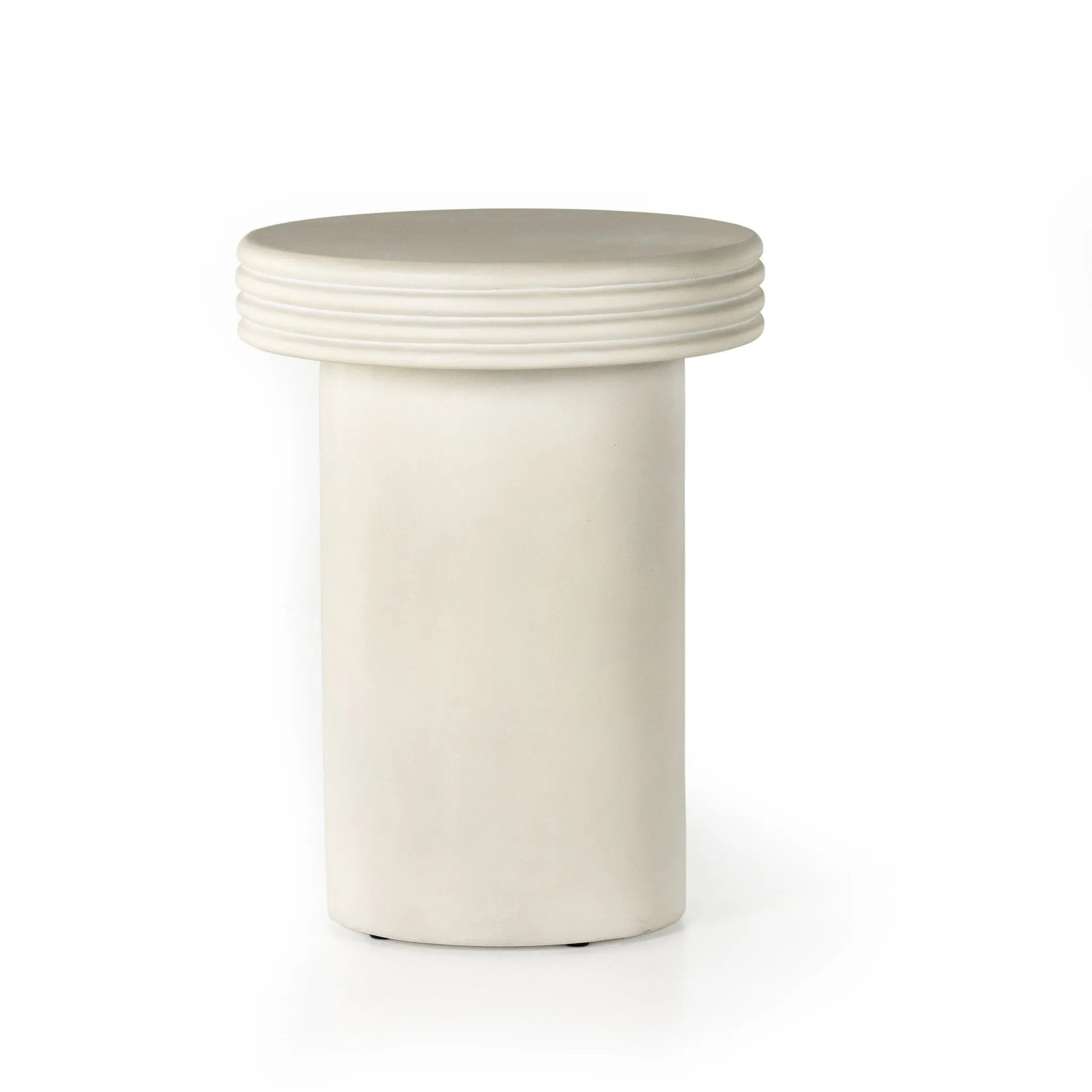 Statuesque and streamlined, an outdoor end table is crafted of smooth solid concrete and detailed with ribbed edging on top. Cover or store indoors during inclement weather and when not in use.As enthusiasts of wabi sabi design at Amethyst, we love the warm modern inspired Grecia Outdoor End Table. Amethyst Home provides interior design, new home construction design consulting, vintage area rugs, and lighting in the San Diego metro area.