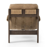 Featuring Halston Palermo Drift Chair by Four Hands at Amethyst Home. Dramatically tufted and angled for comfort, this Seventies-inspired sling seat is made from thick-cut top-grain leather in an earthy taupe, with wide brown ash framing. A plump, pronounced grain accentuates leather's natural markings for a supple, lived-in look.Overall Dimensions: 30.00". Amethyst Home provides interior design, new home construction design consulting, vintage area rugs, and lighting in the Des Moines metro area.