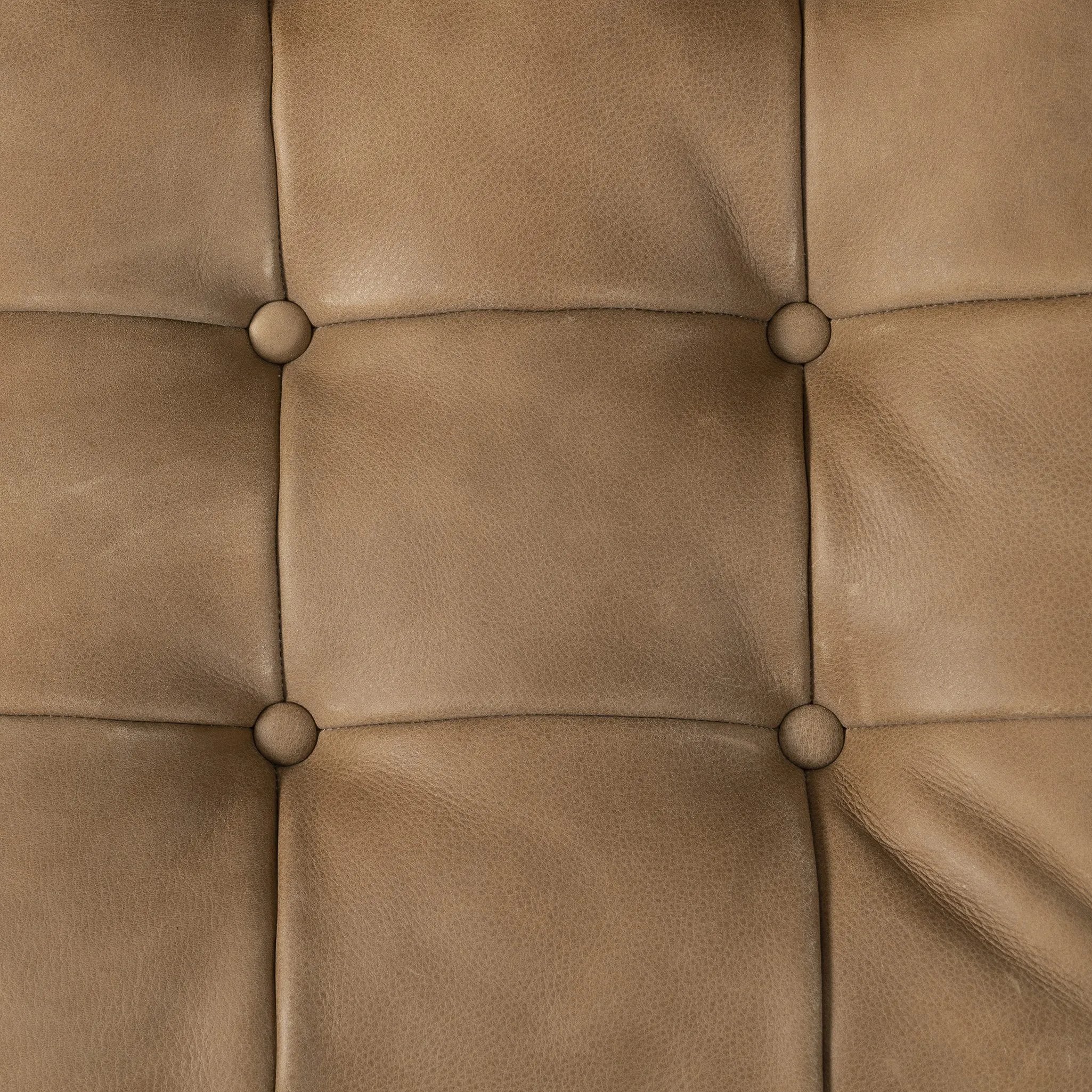 Featuring Halston Palermo Drift Chair by Four Hands at Amethyst Home. Dramatically tufted and angled for comfort, this Seventies-inspired sling seat is made from thick-cut top-grain leather in an earthy taupe, with wide brown ash framing. A plump, pronounced grain accentuates leather's natural markings for a supple, lived-in look.Overall Dimensions: 30.00. Amethyst Home provides interior design, new home construction design consulting, vintage area rugs, and lighting in the Los Angeles metro area.