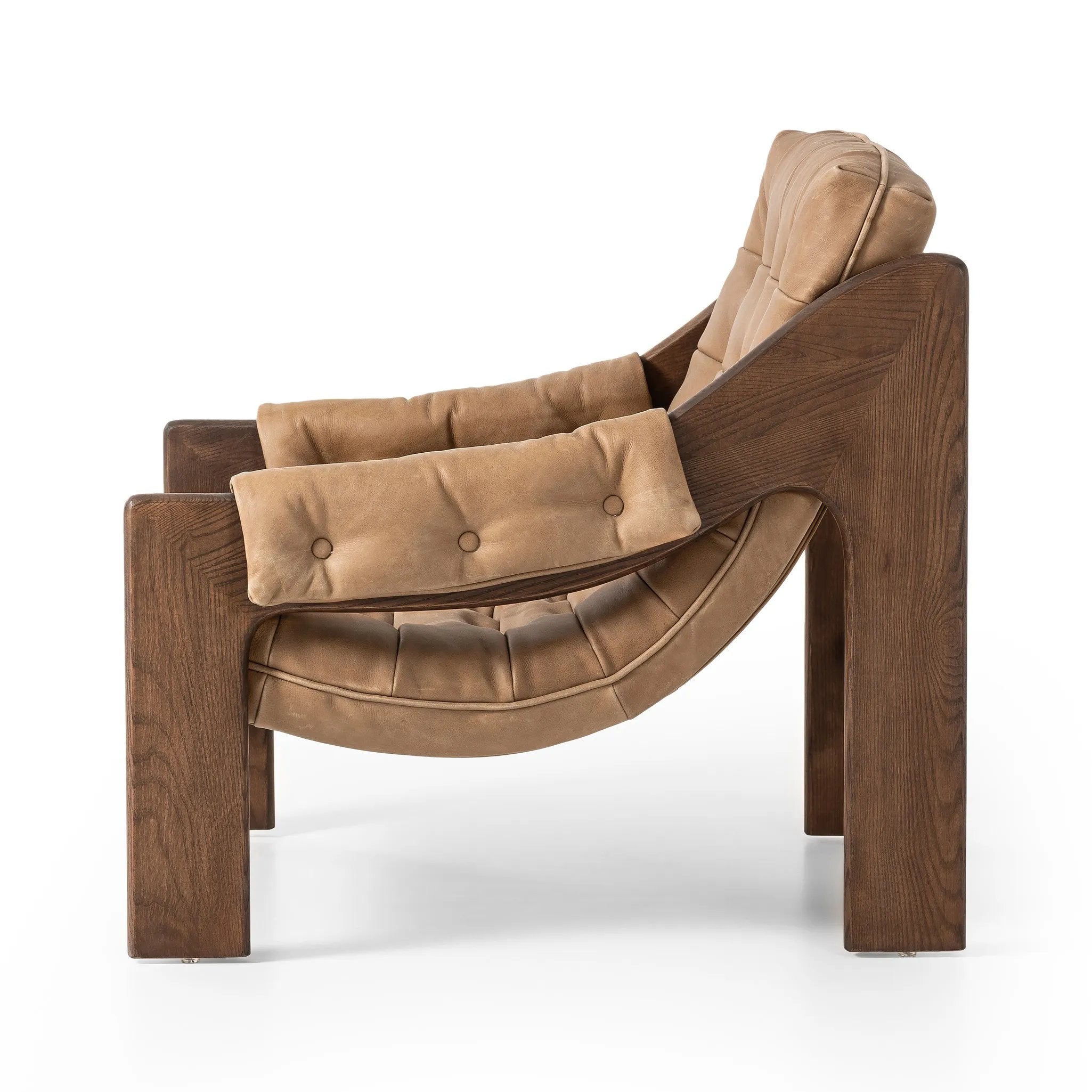 Featuring Halston Palermo Drift Chair by Four Hands at Amethyst Home. Dramatically tufted and angled for comfort, this Seventies-inspired sling seat is made from thick-cut top-grain leather in an earthy taupe, with wide brown ash framing. A plump, pronounced grain accentuates leather's natural markings for a supple, lived-in look.Overall Dimensions: 30.00"w . Amethyst Home provides interior design, new home construction design consulting, vintage area rugs, and lighting in the Monterey metro area.