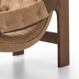 Featuring Halston Palermo Drift Chair by Four Hands at Amethyst Home. Dramatically tufted and angled for comfort, this Seventies-inspired sling seat is made from thick-cut top-grain leather in an earthy taupe, with wide brown ash framing. A plump, pronounced grain accentuates leather's natural markings for a supple, lived-in look.Overall Dimensions: 30.00"w x 3. Amethyst Home provides interior design, new home construction design consulting, vintage area rugs, and lighting in the Omaha metro area.