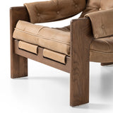 Featuring Halston Palermo Drift Chair by Four Hands at Amethyst Home. Dramatically tufted and angled for comfort, this Seventies-inspired sling seat is made from thick-cut top-grain leather in an earthy taupe, with wide brown ash framing. A plump, pronounced grain accentuates leather's natural markings for a supple, lived-in look.Overall Dimensions: 30. Amethyst Home provides interior design, new home construction design consulting, vintage area rugs, and lighting in the Salt Lake City metro area.