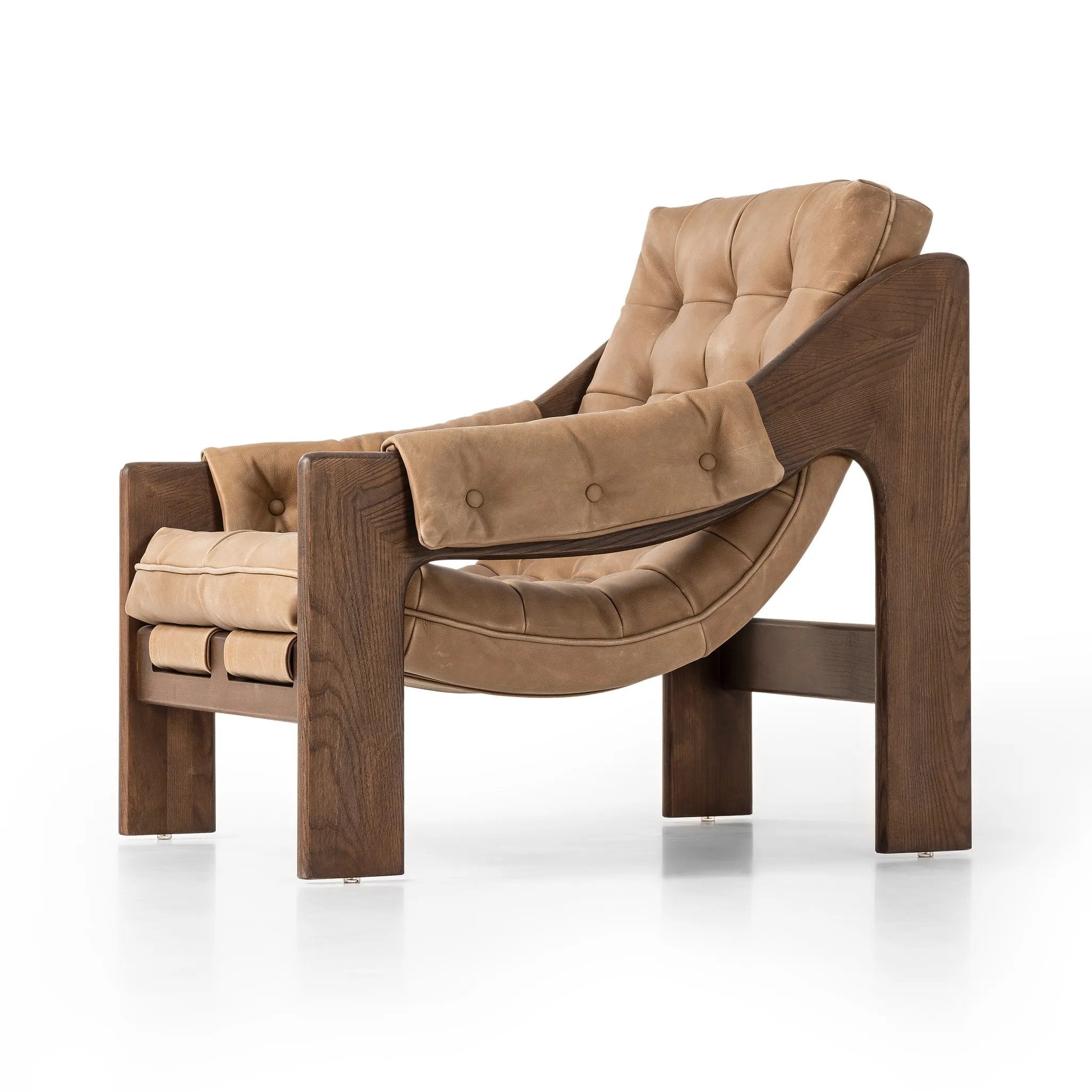 Featuring Halston Palermo Drift Chair by Four Hands at Amethyst Home. Dramatically tufted and angled for comfort, this Seventies-inspired sling seat is made from thick-cut top-grain leather in an earthy taupe, with wide brown ash framing. A plump, pronounced grain accentuates leather's natural markings for a supple, lived-in look.Overall Dimensions: 30.00"w. Amethyst Home provides interior design, new home construction design consulting, vintage area rugs, and lighting in the San Diego metro area.