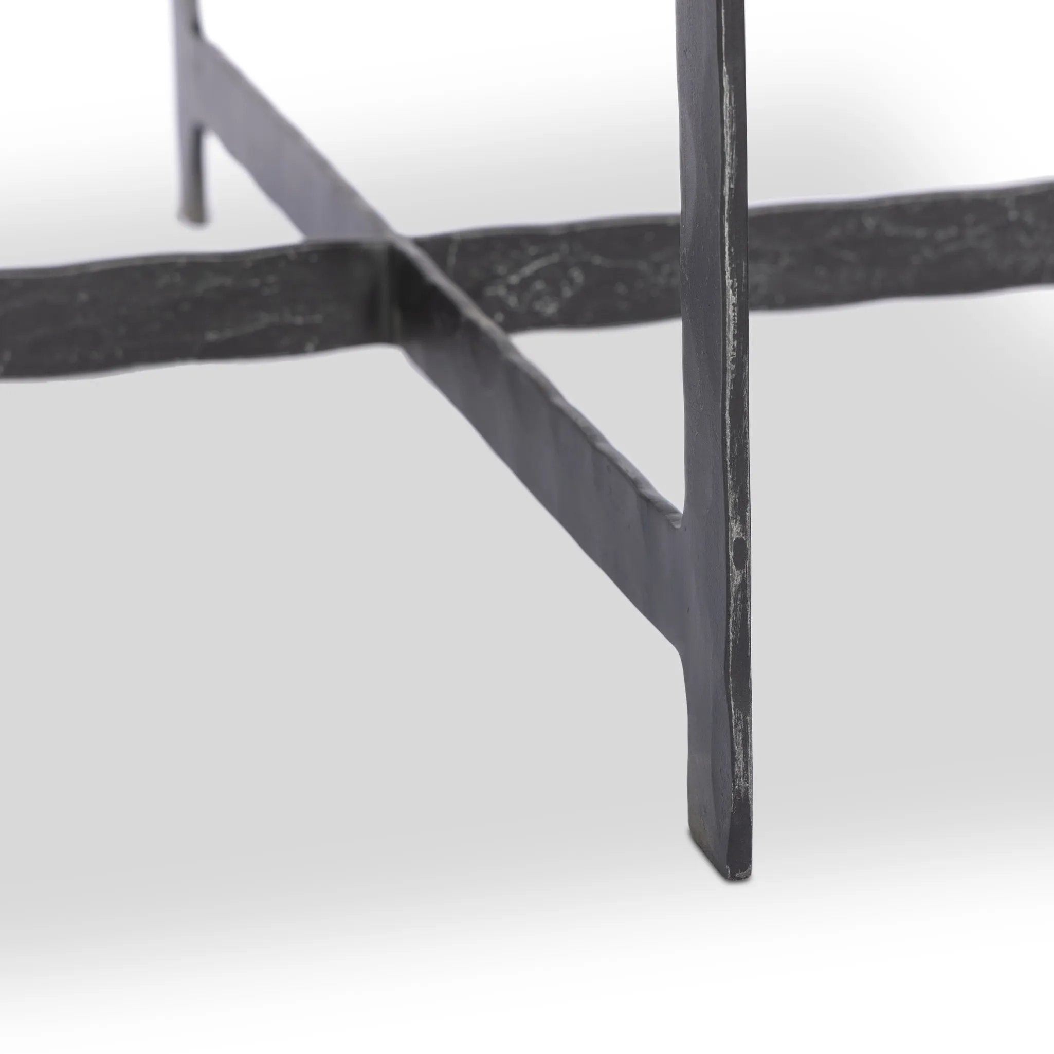Featuring Hammered Charcoal Marble Iron End Table by Four Hands at Amethyst Home. An open, hand-hammered base of black iron supports a squared top of charcoal marble, for a beautifully streamlined look with rustic vibes.Overall Dimensions: 24.00"w x 24.00"d x 22.25"hWeight : 89.90 lbsMaterials: Solid Marble, Iron, Engineered Hardwood. Amethyst Home provides interior design, new home construction design consulting, vintage area rugs, and lighting in the San Diego metro area.