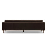 Mid-century modern with a dash of vintage detail, this bench-style sofa makes a statement. With traditional details like turned oak legs and brass casters, this low-profile sofa features an elongated bench seat for an inviting sit. Velvety chocolate-brown upholstery finishes a knife-edge back and boxed arm cushions Amethyst Home provides interior design, new home construction design consulting, vintage area rugs, and lighting in the Portland metro area.
