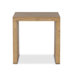 Simple waterfall shaping defined by subtle details. Grain-rich ash offers plenty of movement across the wood, meeting in a prominent scallop cutout detail on each edge for a bold addition of character to this end table. A design collaboration by Amber Lewis and Four Hands. Amethyst Home provides interior design, new home construction design consulting, vintage area rugs, and lighting in the Portland metro area.