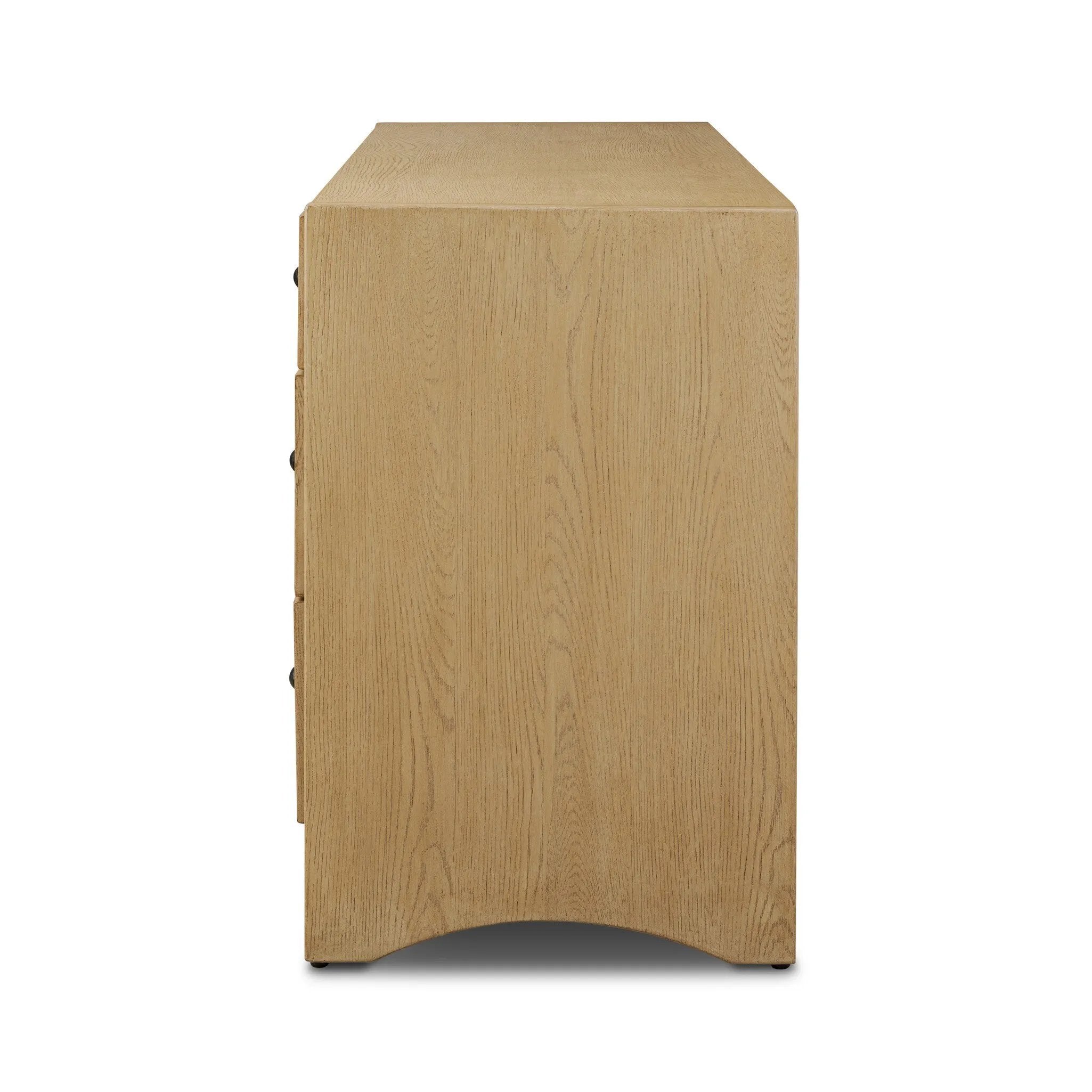 Simple while detailed, this dresser’s trimmed out scallop reeding adds subtle movement and soft texture, complemented by arched side panel legs. Six spacious drawers provide ample storage.As lovers of natural design at Amethyst, we love the optimistic inspired Hazel 6 Drawer Dresser. Amethyst Home provides interior design, new home construction design consulting, vintage area rugs, and lighting in the Laguna Beach metro area.