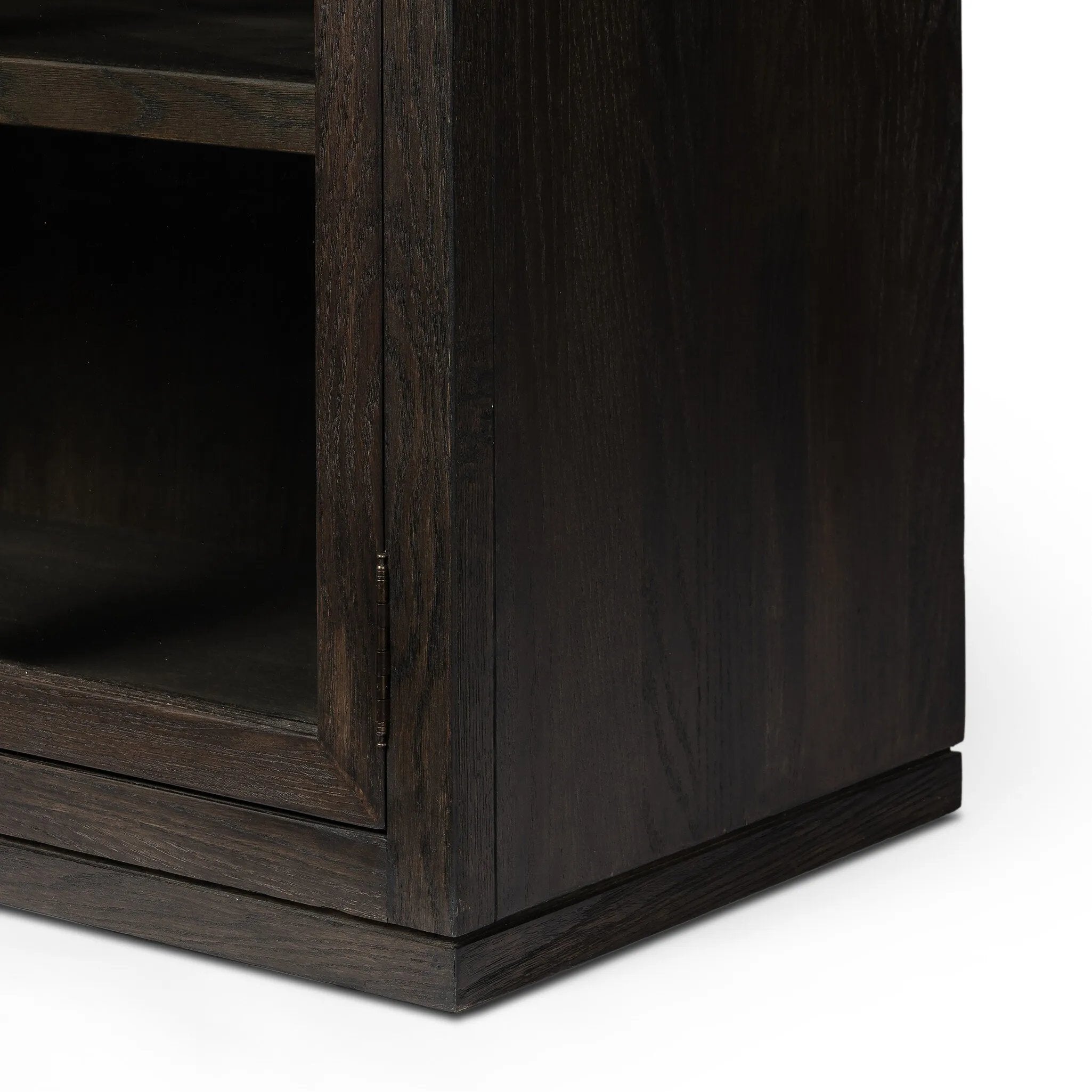 Featuring Hepburn Dark Anthracite Oak Veneer Cabinet by Four Hands at Amethyst Home. Beautifully arched with a flush plinth base, a versatile oak cabinet features a dark, rich finish. With generous interior shelving, a tempered glass front allows you to showcase favorite books and treasures — letting anyone who enters your space know exactly who you are. Ove. Amethyst Home provides interior design, new home construction design consulting, vintage area rugs, and lighting in the Portland metro area.