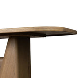 This modern take on the traditional trestle table features two angular bases, mirrored and united by softened square center beam. Dramatically angled legs pull the eye toward beautifully curved detailing. Crafted of oak with a light, natural finish. Amethyst Home provides interior design, new home construction design consulting, vintage area rugs, and lighting in the Monterey metro area.