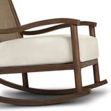 Bring the antique look to the outdoors with this vintage-style outdoor rocking chair. Paired back details let the FSC®-certified teak frame, crosshatch cane panel back and sink-in cushioned seat tell a story of comfort and character. Cover or store inside during inclement weather and when not in use. Amethyst Home provides interior design, new home construction design consulting, vintage area rugs, and lighting in the Omaha metro area.