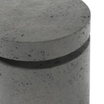 This outdoor propane tank enclosure pairs with fire tables for a clean, seamless look. Made from glass-reinforced concrete, each piece is naturally finished with deep tones of pewter and dark grey. It can act as an end table with its lid on, and has cutouts at the base for hose attachments. Amethyst Home provides interior design, new home construction design consulting, vintage area rugs, and lighting in the Park City metro area.