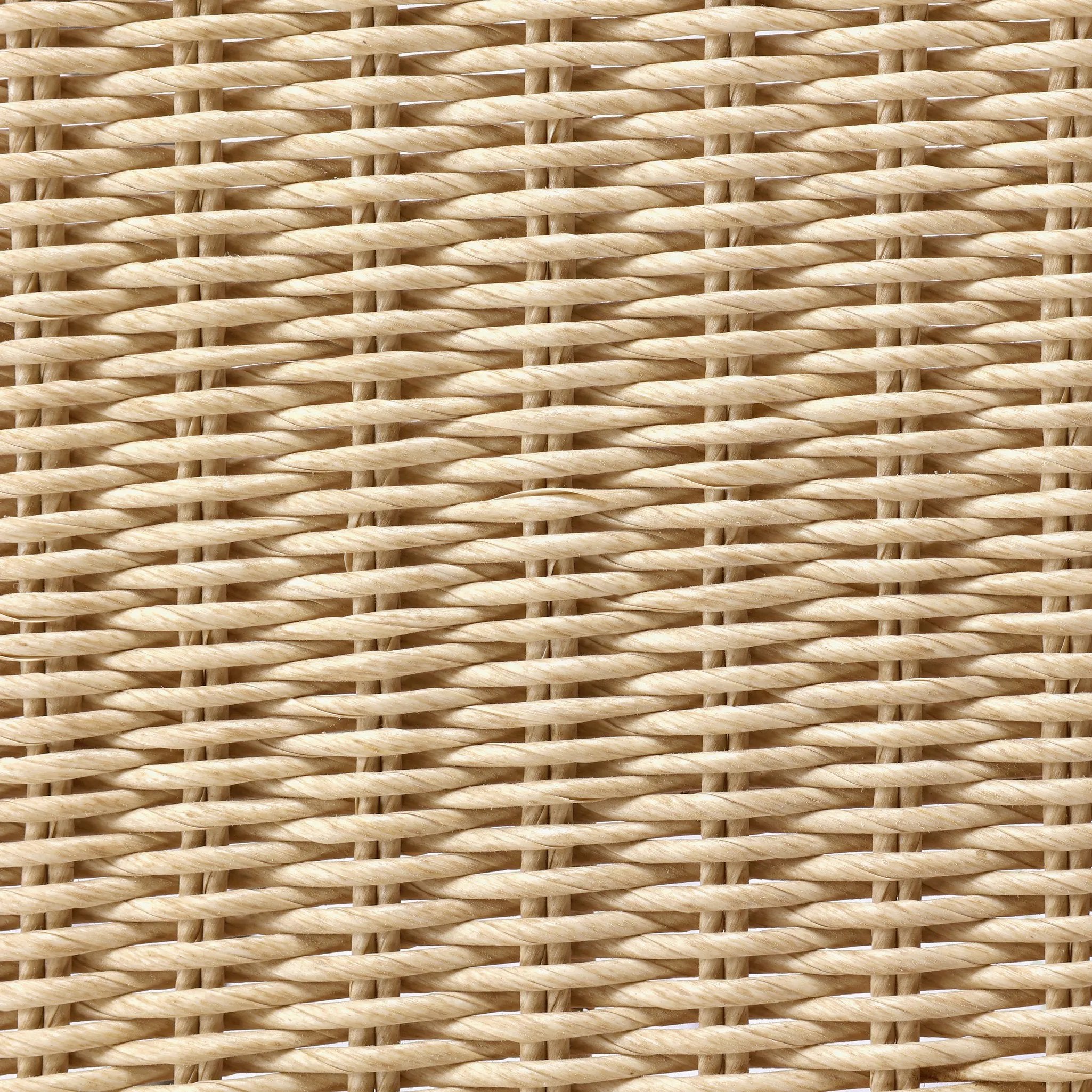 A light, airy take on the traditional bistro shape. This outdoor dining chair features exaggerated splayed legs and a curved X-shaped stretcher, with a handle detail cut out of the woven seat back. Finished with a seat cushion. Cover or store indoors during inclement weather and when not in use Amethyst Home provides interior design, new home construction design consulting, vintage area rugs, and lighting in the Boston metro area.