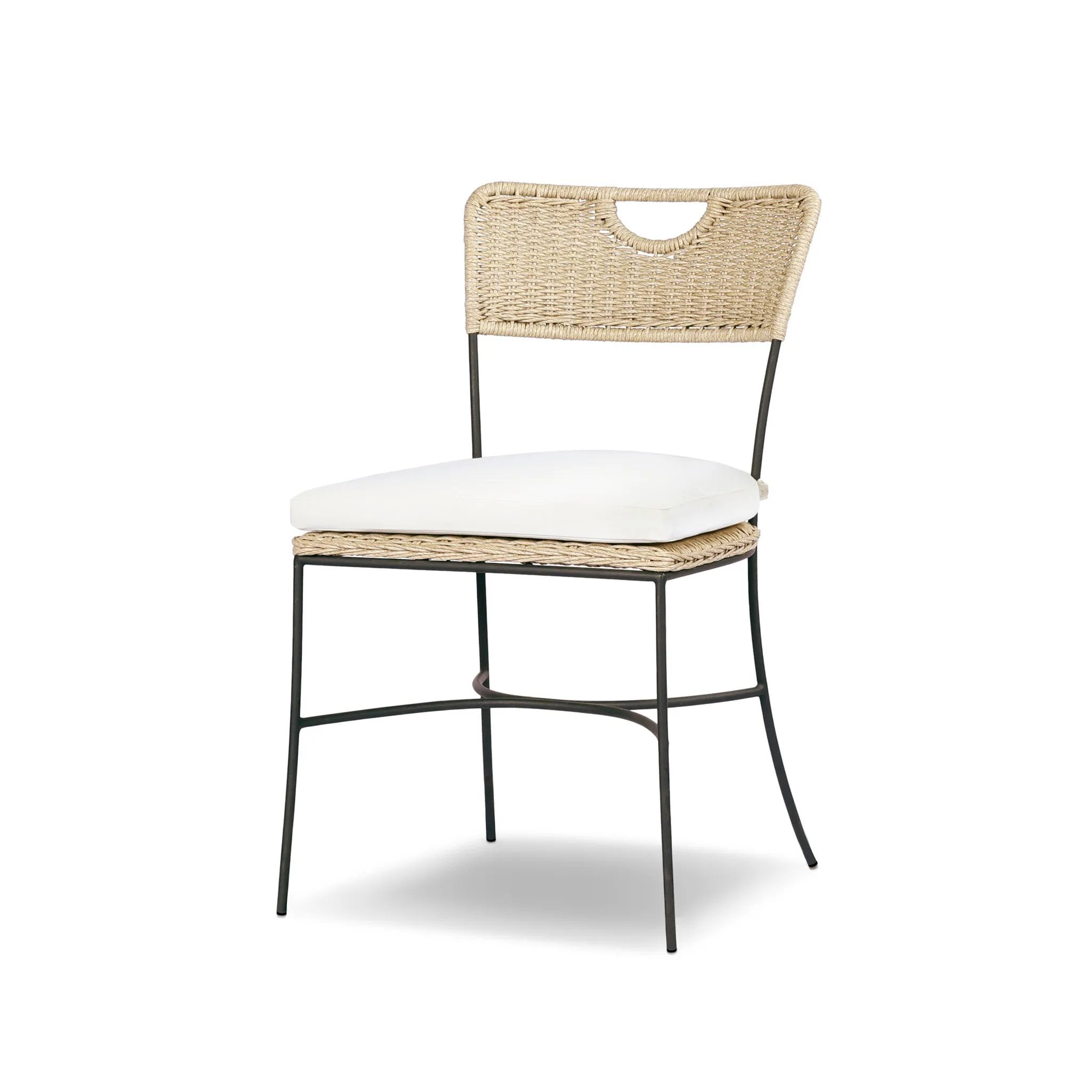 A light, airy take on the traditional bistro shape. This outdoor dining chair features exaggerated splayed legs and a curved X-shaped stretcher, with a handle detail cut out of the woven seat back. Finished with a seat cushion. Cover or store indoors during inclement weather and when not in use Amethyst Home provides interior design, new home construction design consulting, vintage area rugs, and lighting in the Park City metro area.