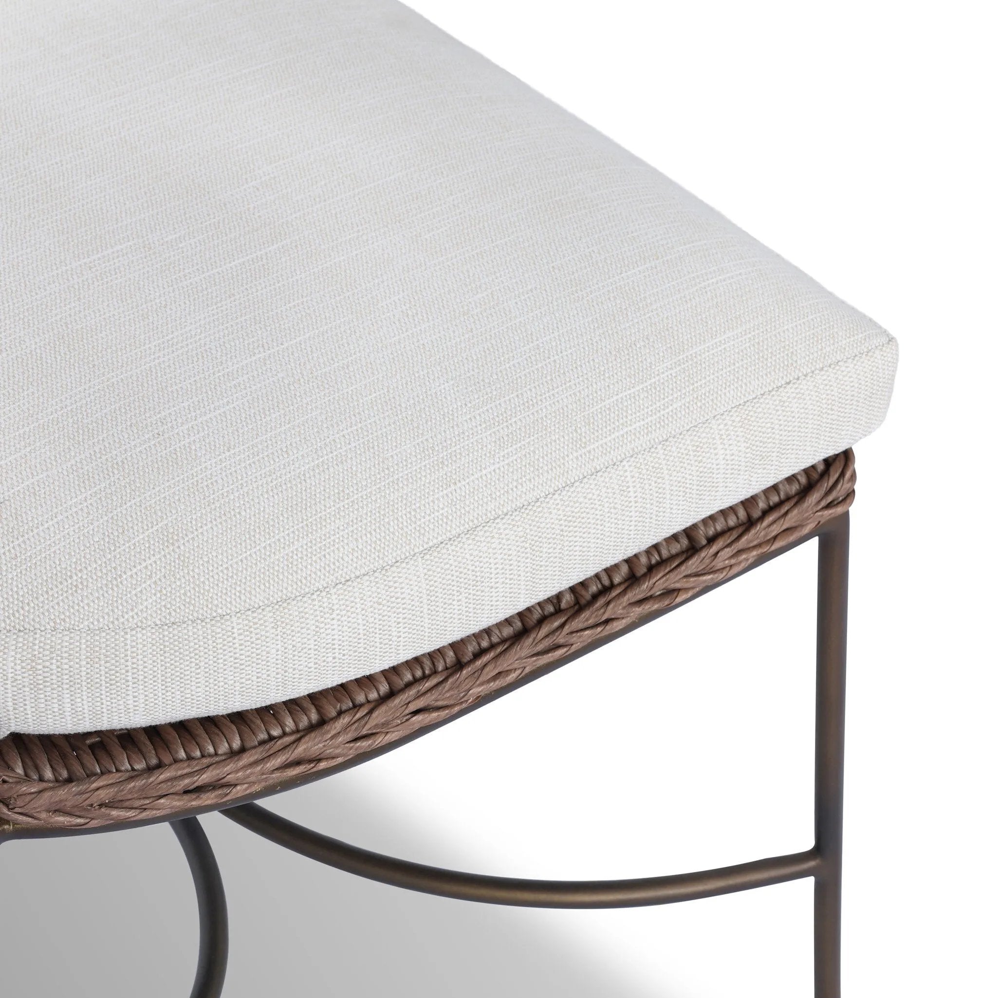 A light, airy take on the traditional bistro shape. This outdoor dining chair features exaggerated splayed legs and a curved X-shaped stretcher, with a handle detail cut out of the woven seat back. Finished with a seat cushion. Cover or store indoors during inclement weather and when not in use. Amethyst Home provides interior design, new home construction design consulting, vintage area rugs, and lighting in the Monterey metro area.