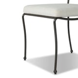 Inspired by Art Deco designs, this outdoor dining chair introduces a sense of movement to a classic silhouette. Subtly curved metal framing, a woven back and upholstered seat cushion craft a thoughtful mix of materials. Cover or store inside during inclement weather and when not in use. Amethyst Home provides interior design, new home construction design consulting, vintage area rugs, and lighting in the Laguna Beach metro area.